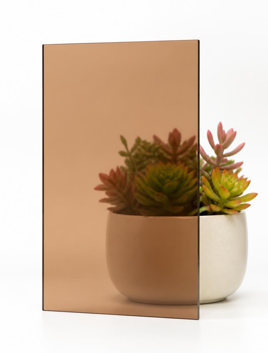 Bronze tinted shower glass sample with a warm amber tone
